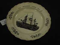Lot 35 - An English creamware plate for the Dutch market