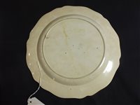 Lot 31 - A salt-glazed polychrome plate and a pearlware plate