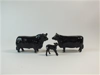 Lot 83 - A family group of three Beswick Aberdeen Angus cattle