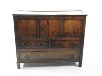 Lot 297 - A George III oak mule chest