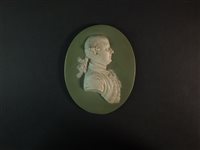 Lot 32 - A Wedgwood green jasperware plaque of Thomas Bentley