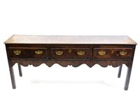 Lot 572 - George III oak and walnut cross banded dresser base