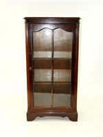 Lot 315 - A 20th century mahogany veneered display cabinet