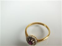 Lot 130 - Ruby and diamond ring