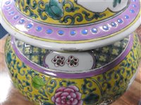 Lot 43 - A pair of lidded Chinese porcelain famille rose vases and one other