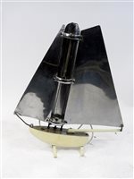 Lot 169 - A Bunting Art Deco room heater in the form of a yacht