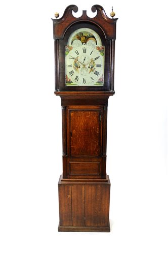 Lot 405 - A George IV oak cross banded longcase clock