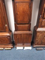 Lot 405 - A George IV oak cross banded longcase clock