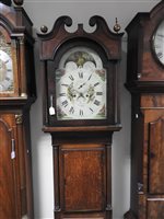 Lot 405 - A George IV oak cross banded longcase clock