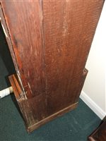 Lot 405 - A George IV oak cross banded longcase clock