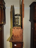 Lot 405 - A George IV oak cross banded longcase clock