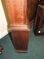 Lot 405 - A George IV oak cross banded longcase clock