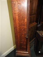Lot 405 - A George IV oak cross banded longcase clock