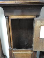 Lot 405 - A George IV oak cross banded longcase clock