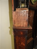Lot 405 - A George IV oak cross banded longcase clock