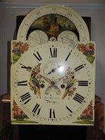 Lot 405 - A George IV oak cross banded longcase clock