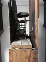 Lot 405 - A George IV oak cross banded longcase clock