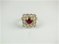 Lot 179 - A ruby and diamond cluster ring