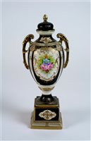 Lot 120 - A Noritake twin-handled vase and cover