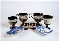 Lot 61 - Ten pieces of copper lustre and a pair of Willow pattern dishes