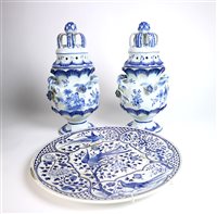 Lot 65 - A blue and white Asiatic pheasant charger and a pair of Delft pot pourri vases