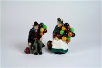 Lot 45 - A pair of Royal Doulton figures of The Old Balloon Seller and Balloon Man