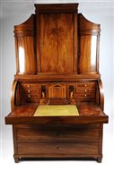 Lot 573 - A 19th century Danish mahogany cylinder bureau