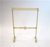 Lot 303 - An early 20th century towel rack in the Gothic manner