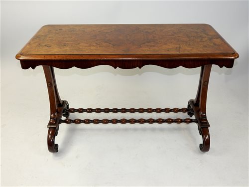 Lot 107 - A Victorian quarter veneered walnut side table