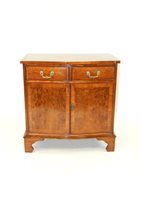 Lot 260 - A Bevan Funnell Reprodux crossbanded figured walnut side cabinet