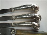 Lot 23 - Four Old English pattern silver tablespoons