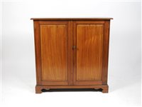 Lot 250 - An Edwardian Mahogany two door cabinet