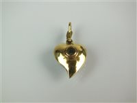 Lot 122 - An emerald and diamond witches heart pendant