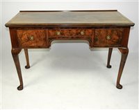 Lot 262 - An Edwards and Roberts walnut veneered dressing table