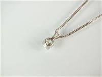 Lot 134 - A single stone diamond pendant