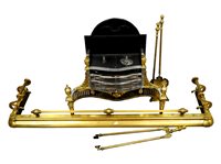 Lot 128 - A large Victorian brass fireside fender together with associated brass fireside tools.