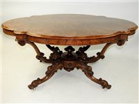 Lot 155 - A Victorian figured walnut centre table circa 1860