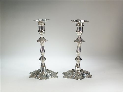 Lot 57 - A pair of silver candlesticks