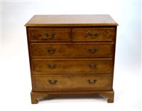 Lot 278 - A George III style burr elm veneered chest of drawers