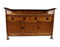 Lot 165 - An Arts and Crafts oak sideboard