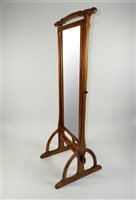 Lot 569 - A modern walnut framed cheval mirror