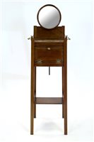 Lot 376 - An Edwardian mahogany and variegated marble top shaving stand.