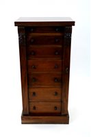 Lot 365 - A reproduction hardwood Wellington chest in Victorian style