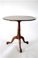 Lot 314 - A George III elm tripod table