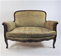 Lot 386 - A Louis XV style beech framed canapé