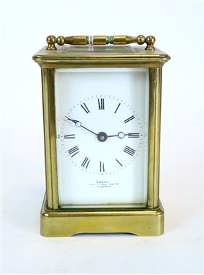 Lot 586 - A small brass cased carriage clock