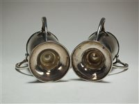 Lot 41 - A pair of silver pepperettes
