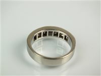 Lot 136 - A platinum diamond half eternity ring