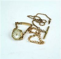 Lot 41 - A bracelet, watch and chain