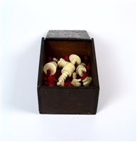 Lot 165 - A 19th century part stained ivory chess set